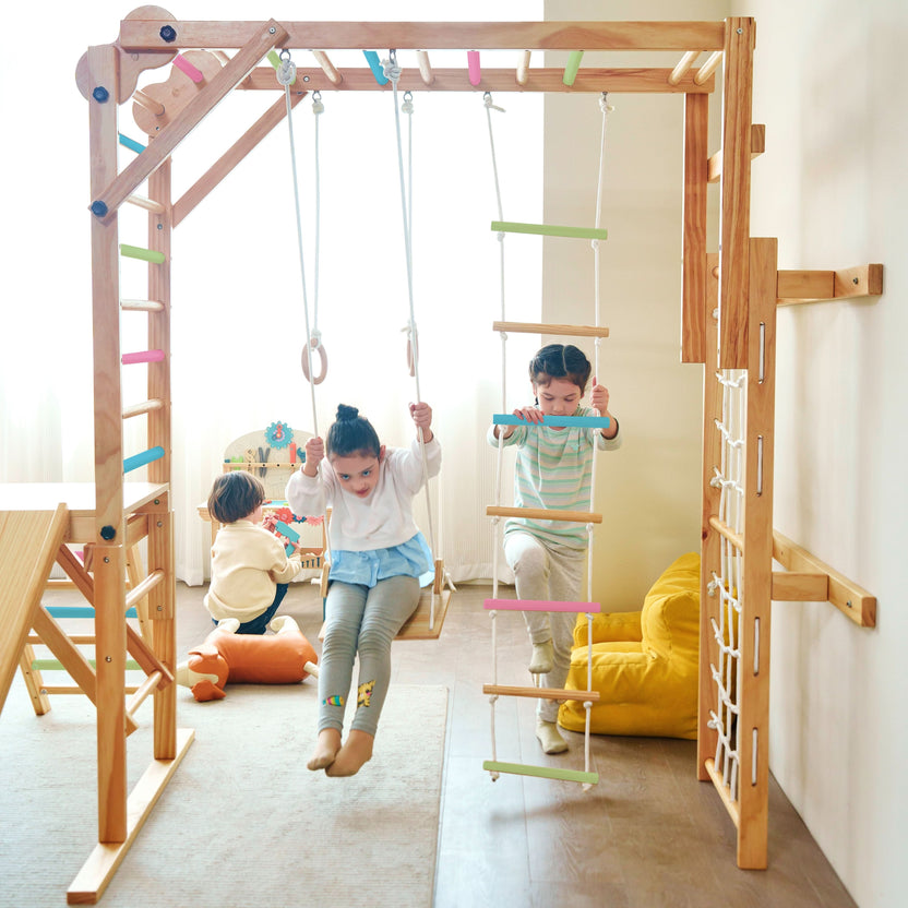 Toddler playing actively indoors on Avenlur wooden play equipment