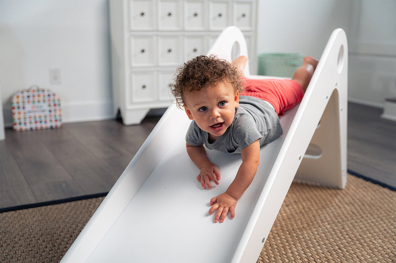 Toddler Climbing Up Manuka - Avenlur's Safe and Fun Indoor Toddler Slide in Playroom.