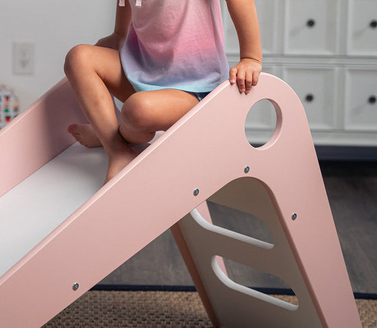 Toddler Climbing Up Manuka - Avenlur's Safe and Fun Indoor Toddler Slide in Playroom.