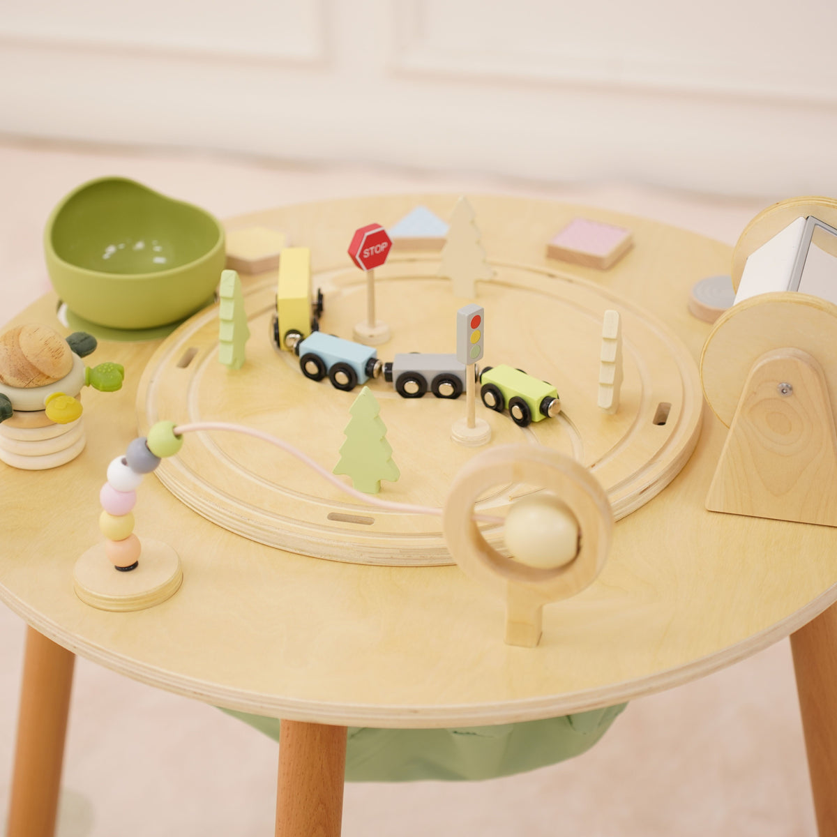 Avenlur Aldar wooden activity center in a playroom