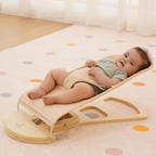 Avenlur Fir baby rocker and bouncer seat in natural wood