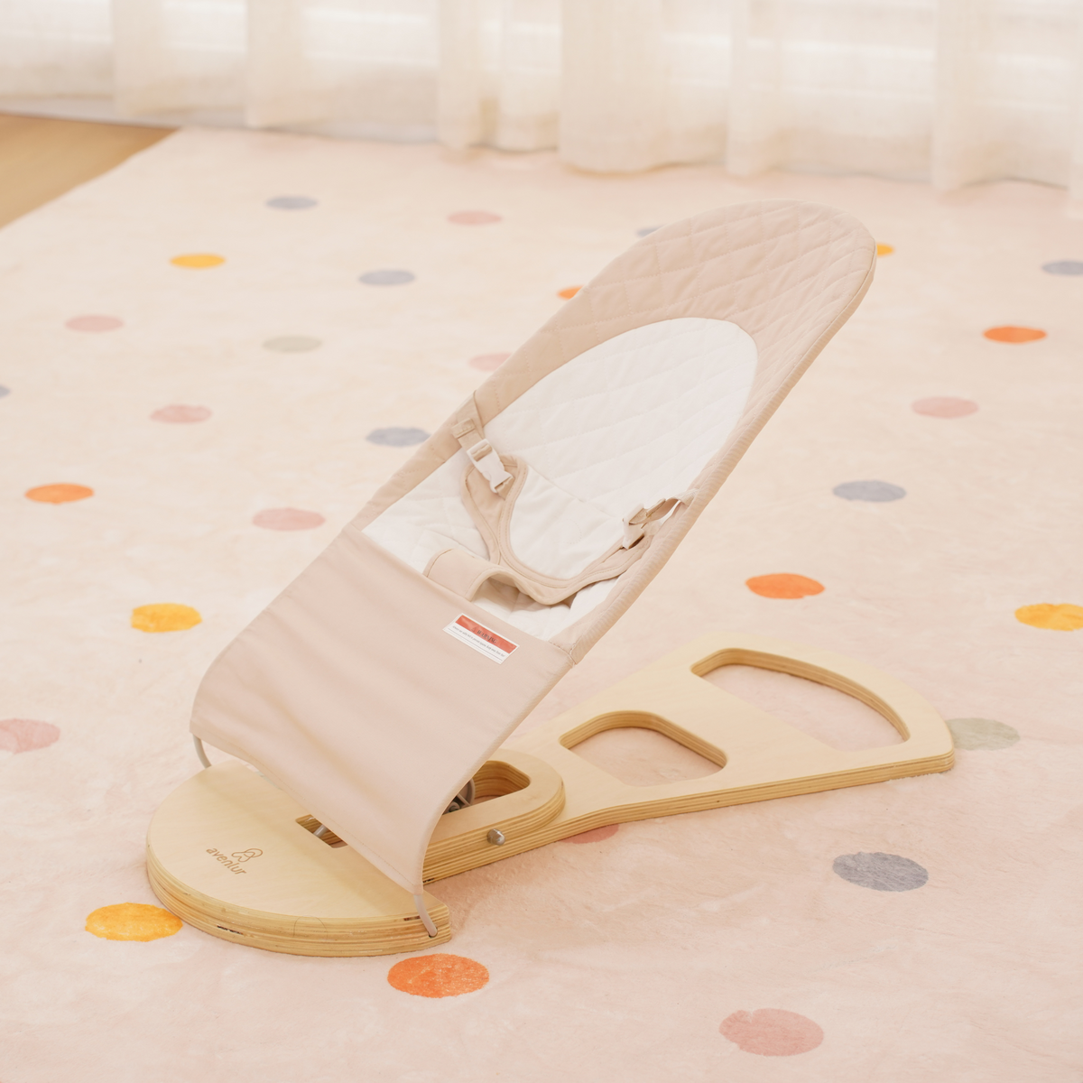 Avenlur Fir wooden baby bouncer, foldable with a soft padded seat