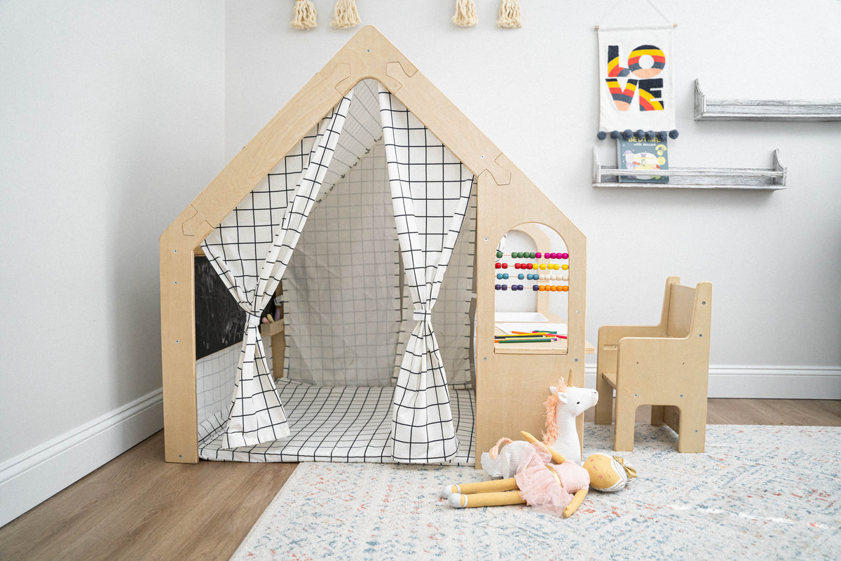 Two kids playing in the Avenlur Flair playhouse