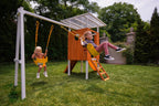 Child on the belt swing of the Avenlur Forest Small swing set