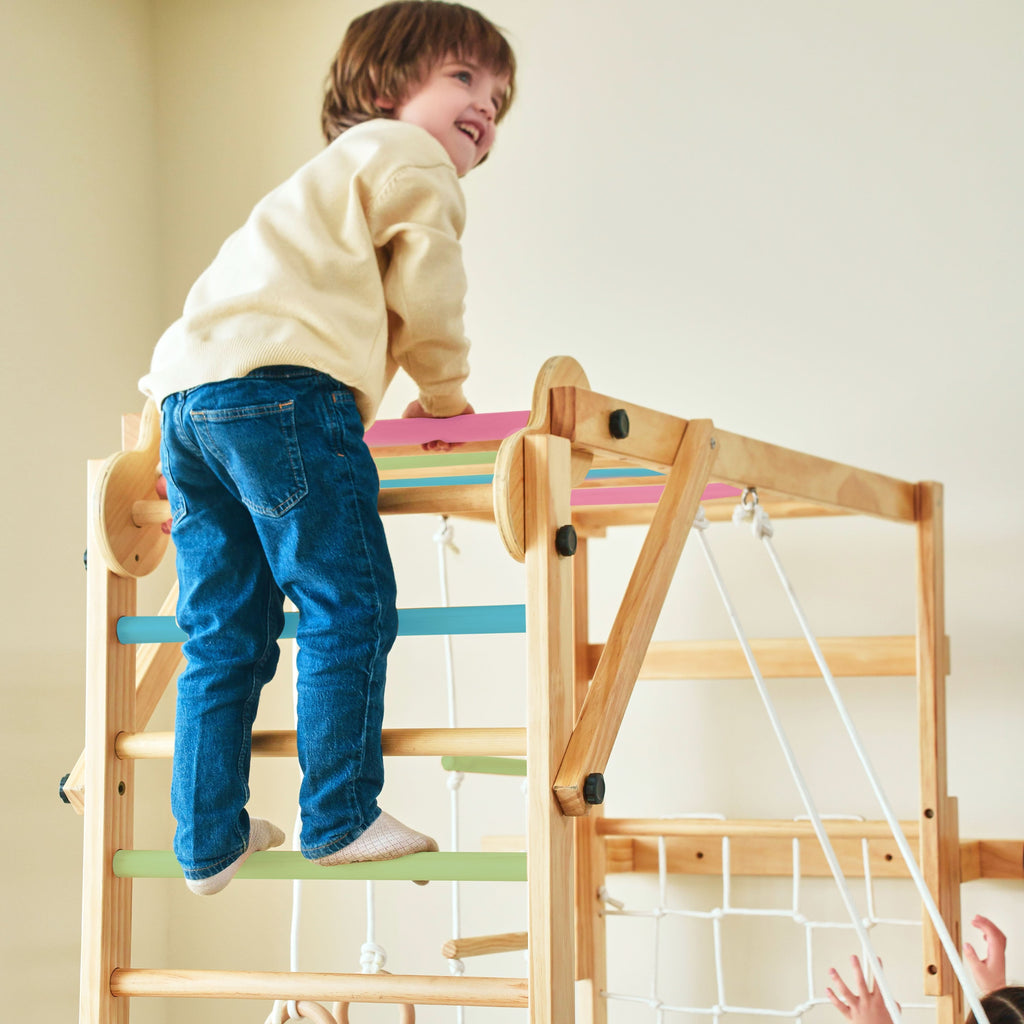 Avenlur Grove kids indoor jungle gym folded flat against the wall to save space