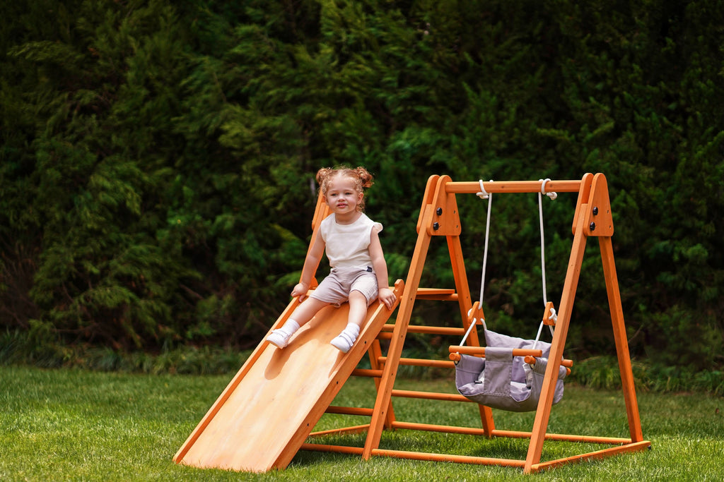 Avenlur Juniper wooden outdoor climber in a backyard play area