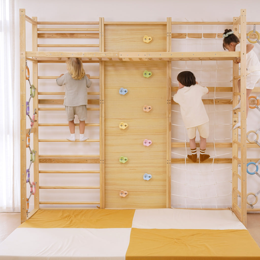 Child hanging from the Avenlur monkey bar attachment