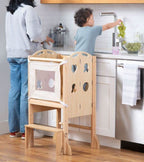Avenlur Plum foldable kitchen tower for toddlers at the counter