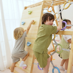 Child climbing the Avenlur Sweetgum XL rope wall