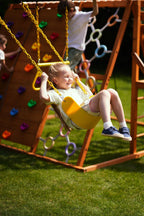 Wave slide on the Avenlur Sycamore Jumbo outdoor wooden swing set and jungle gym