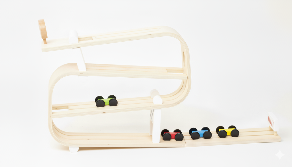 Toddler racing cars down the Avenlur car ramp