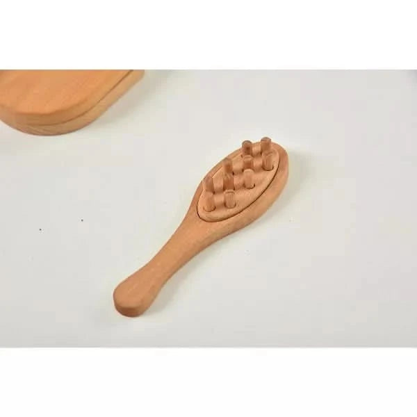 Child playing with the Avenlur wooden pretend makeup kit