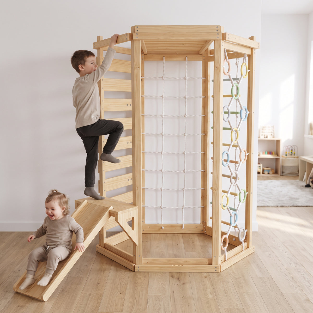 Boy climbing the wooden ladder side of the Avenlur Hawthorn indoor climbing gym while a toddler slides down