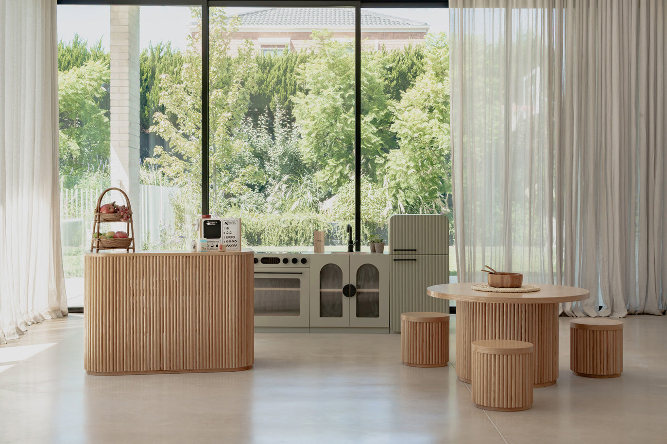Sage Fluted play oven within the full play kitchen in a styled room