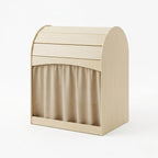Beige wooden toy box with a curtain on a white background