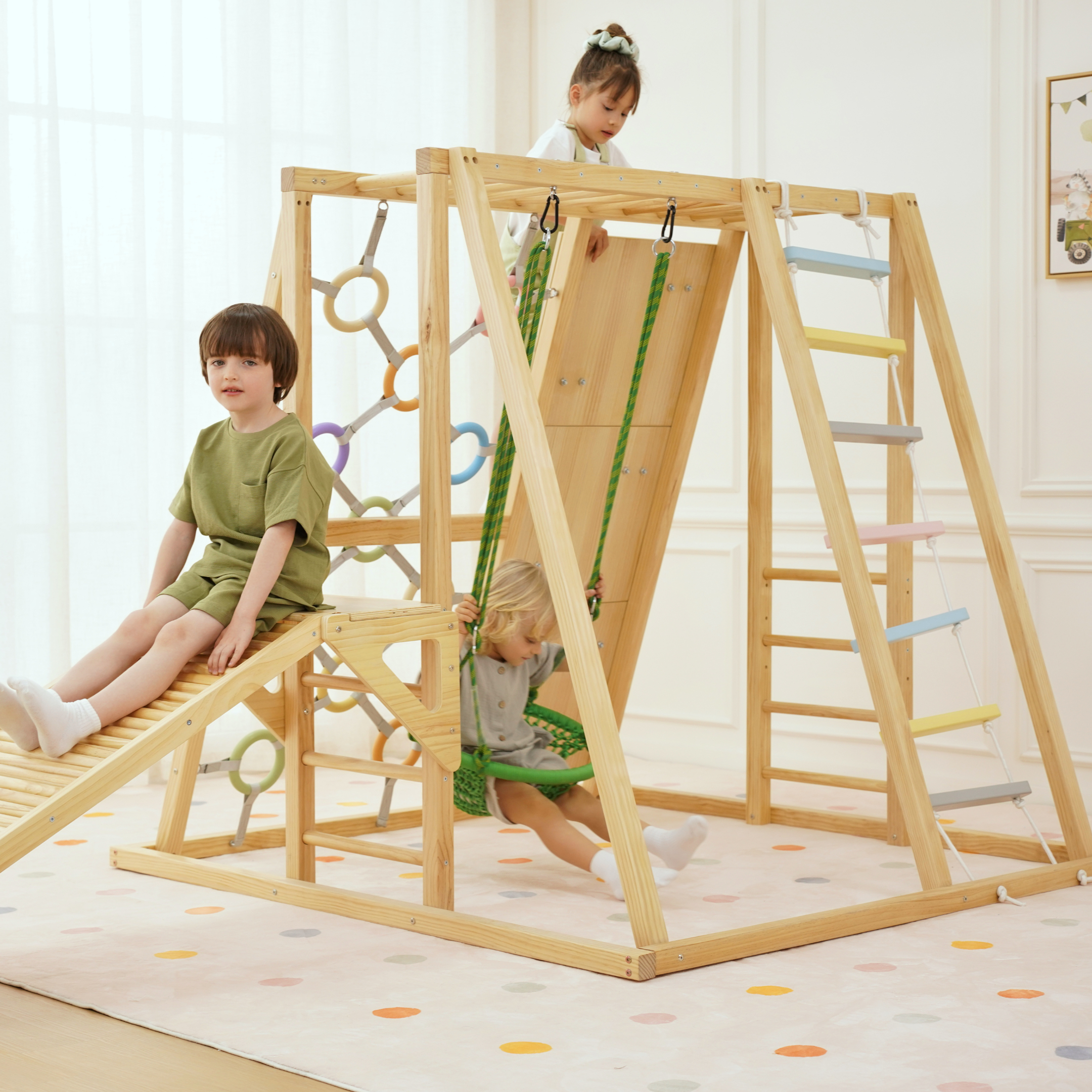 Multiple kids playing on Avenlur Sweetgum indoor climber with swing, slide, rope ladder, and climbing wall
