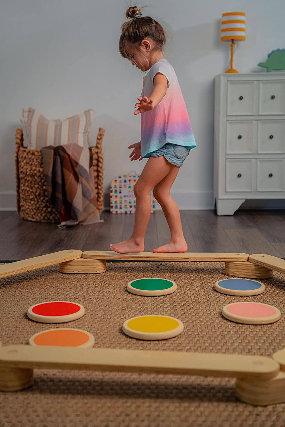 Girl Balancing on Avenlur's Majesty Balance Beam with Stepping Stones