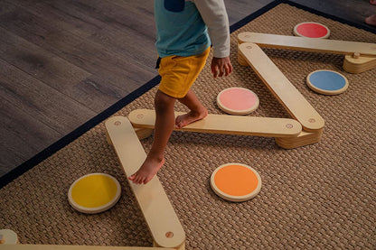 Child Balancing on Avenlur's Majesty Balance Beam with Stepping Stones