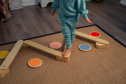 Child Balancing on Avenlur's Majesty Balance Beam with Stepping Stones