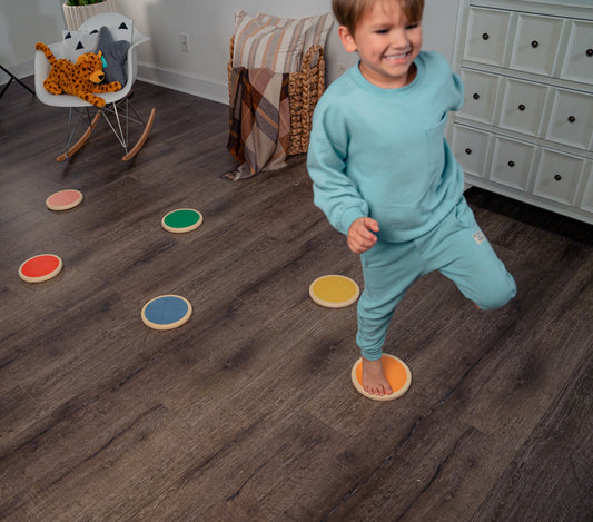 Boy in Playroom Hopping on Hopper - Avenlur's Set of 6 Stepping Stones for Kids Made from Natural Birchwood