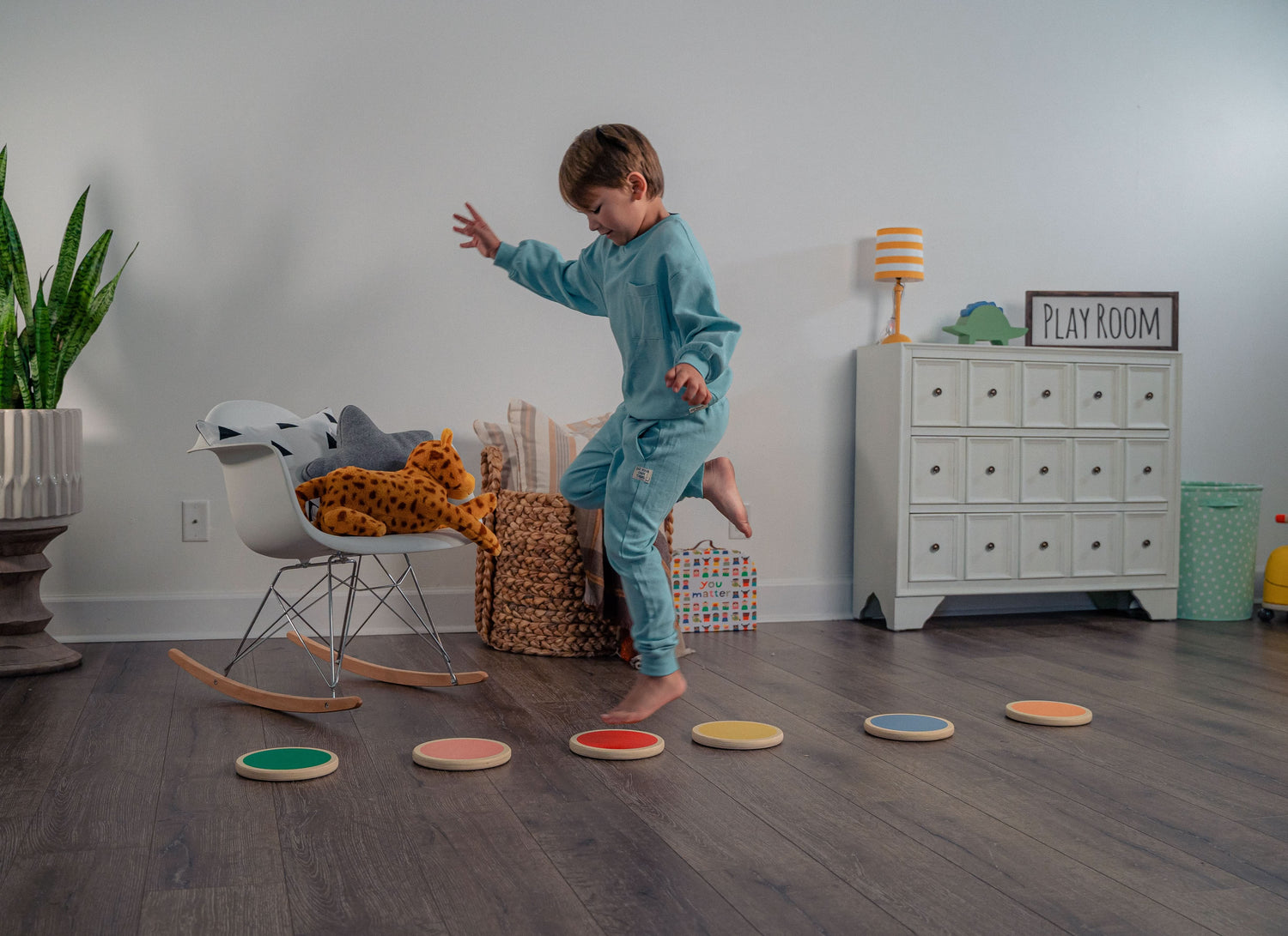 Child in Playroom Playing on Hopper - Avenlur's Set of 6 Stepping Stones for Kids Made from Natural Birchwood