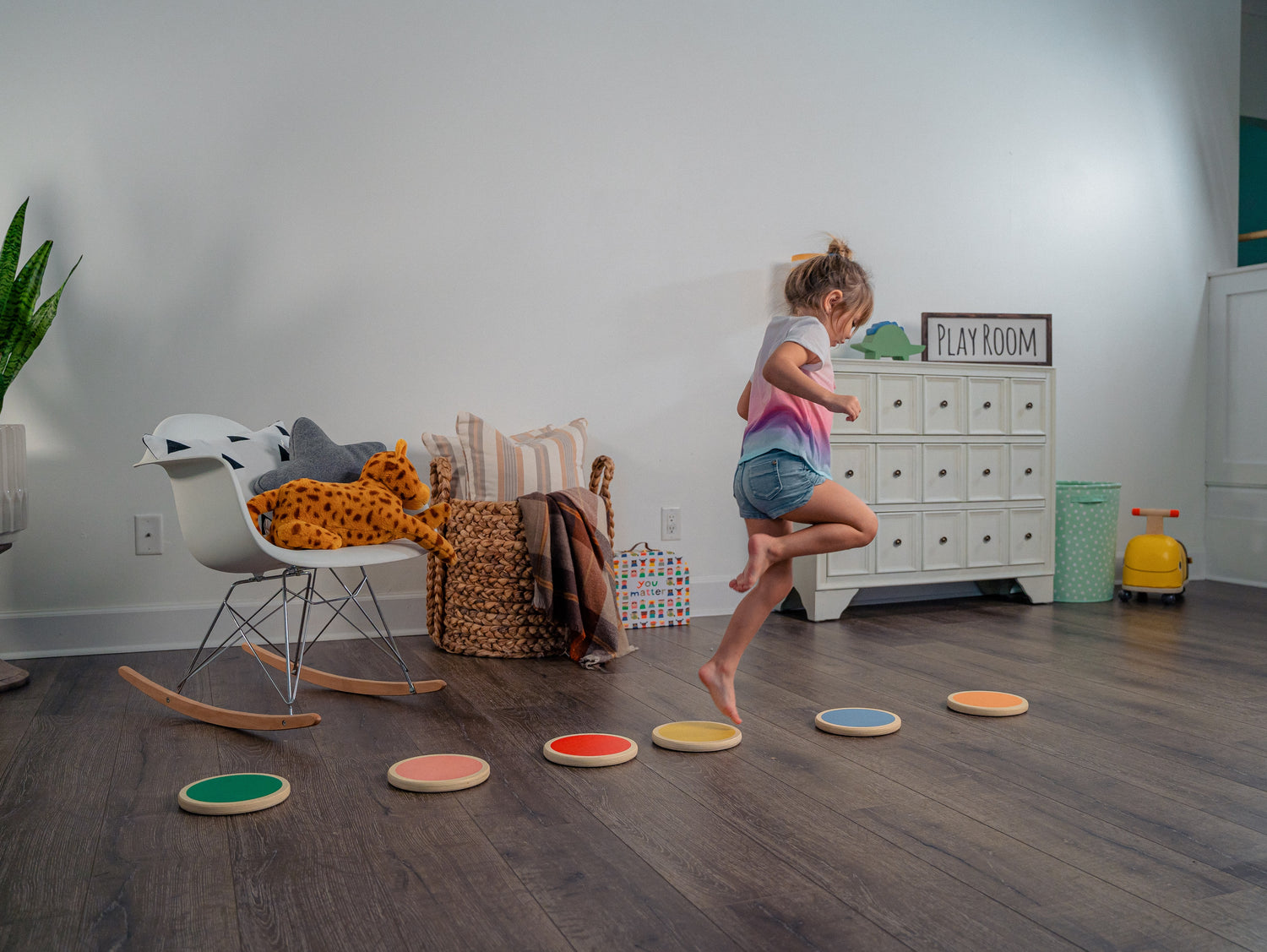 Girl in Playroom Playing on Hopper - Avenlur's Set of 6 Stepping Stones for Kids Made from Natural Birchwood