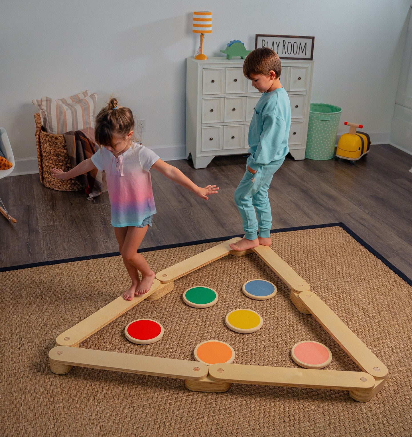 Children Balancing on Avenlur's Majesty Balance Beam with Stepping Stones