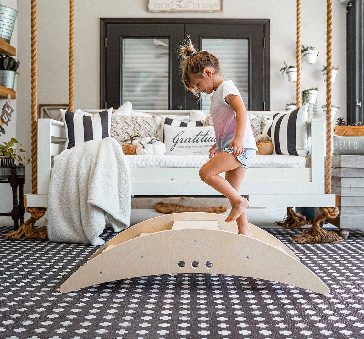 Girl Crossing Rowan - Avenlur's Reversible Rocking Boat & Bridge in Bridge Configuration