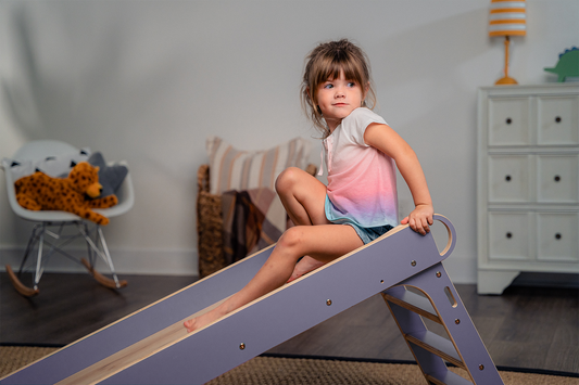 Cute Girl Sitting on Avenlur's Holland Folding Slide in Purple