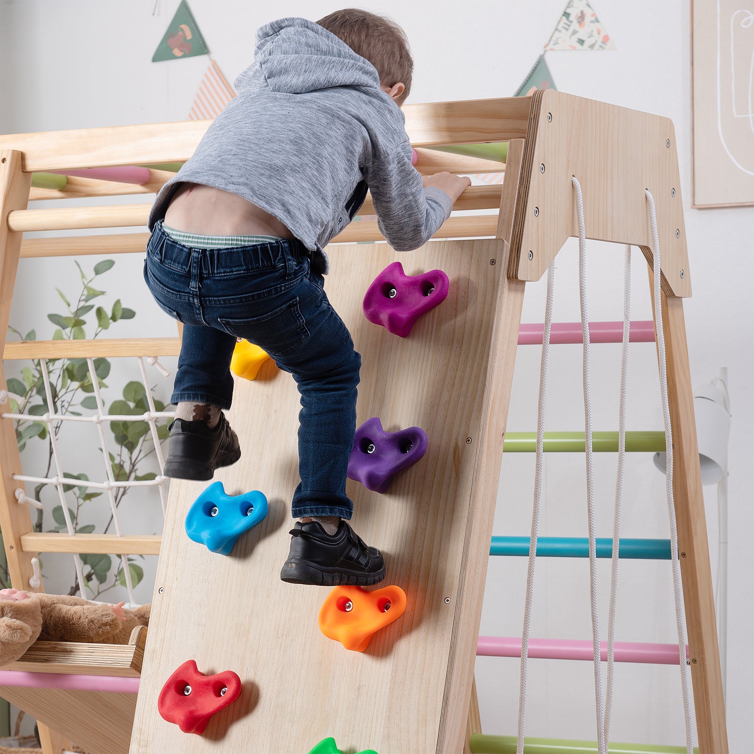 Child Climbing on Avenlur's Magnolia Real Wood Playset's Rock Wall
