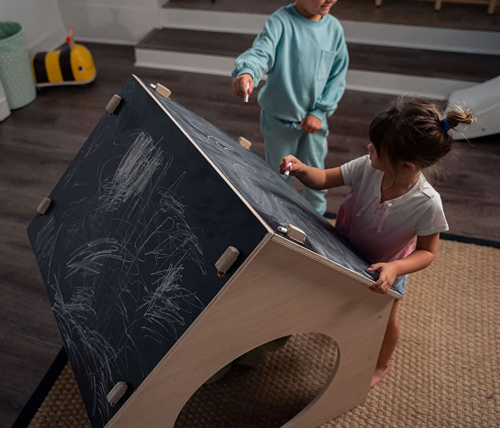 Avenlur Evergreen playhouse used as a kids reading nook