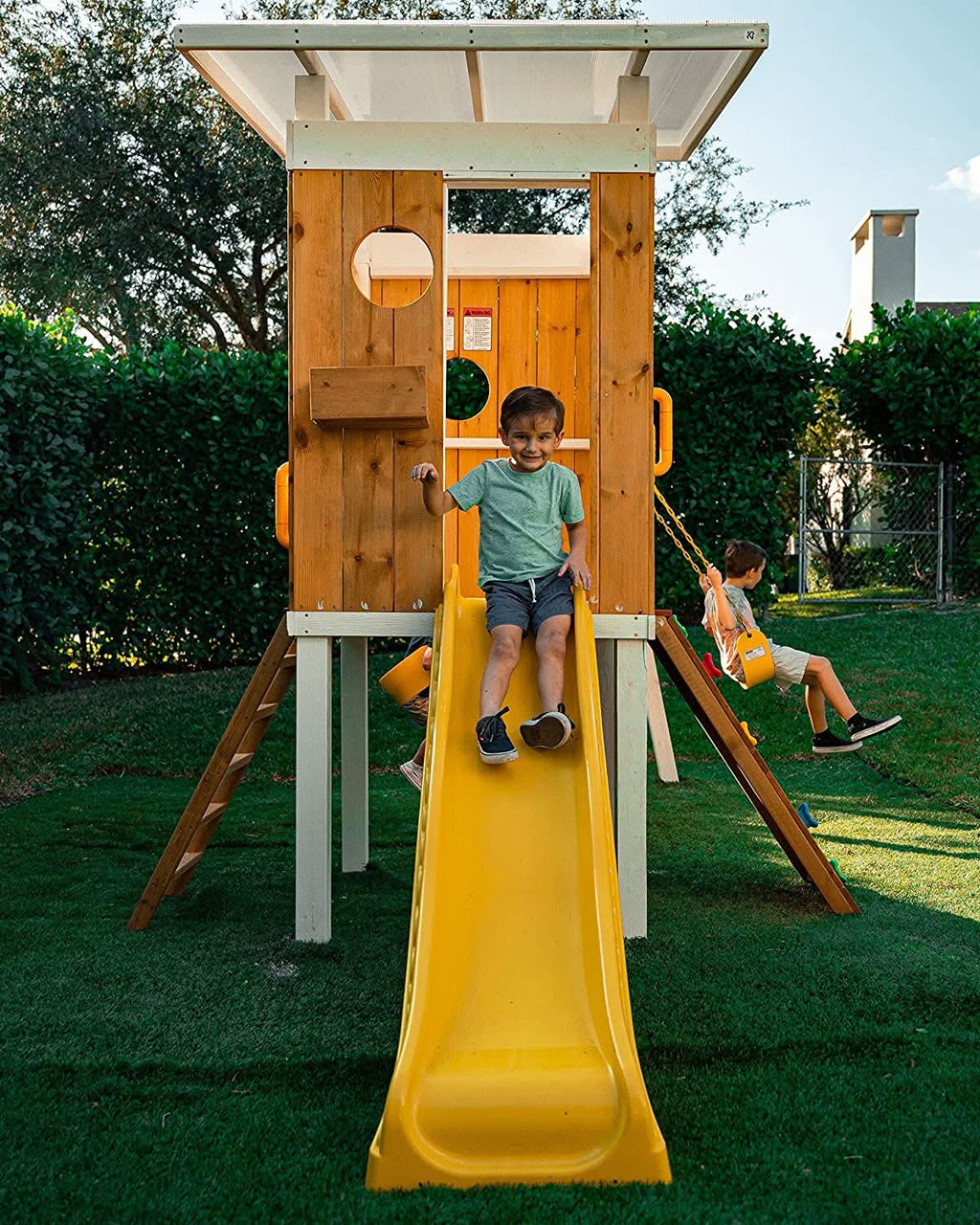 Avenlur Forest swing set with two belt swings and trapeze bar