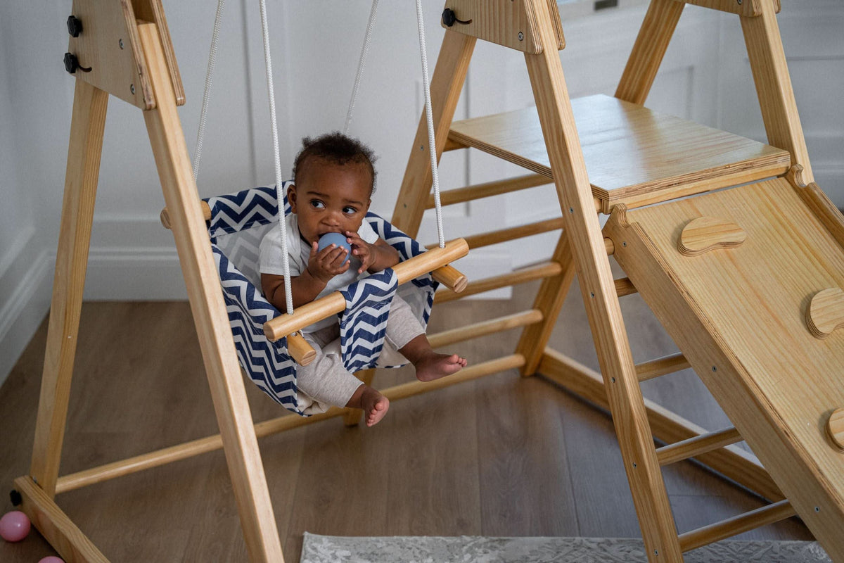 Avenlur Juniper folding toddler climber set up in a bright room