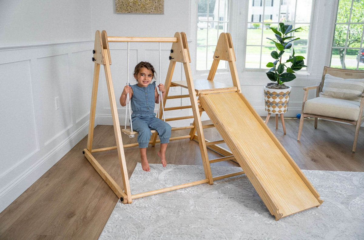 Avenlur Juniper toddler climbing toy with swing for gross motor play