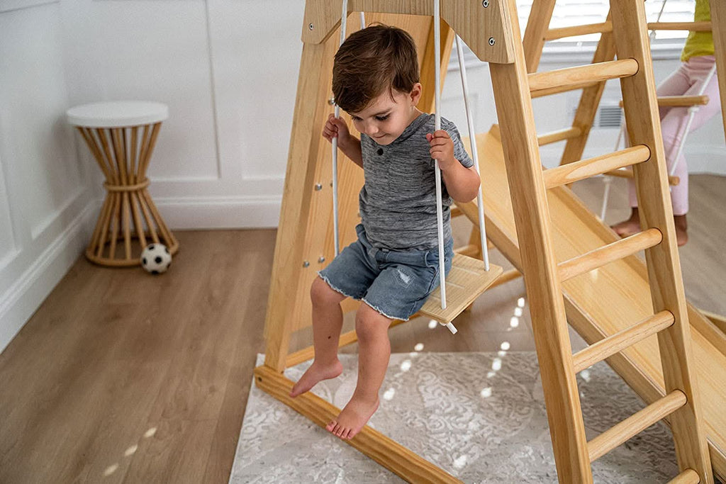 Avenlur Magnolia wooden indoor jungle gym with monkey bars, rock wall and slide