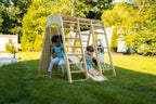 Avenlur Magnolia indoor and outdoor wooden jungle gym set up in a backyard