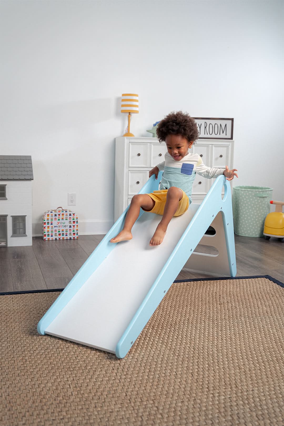 Avenlur Manuka wooden slide for kids in a modern playroom