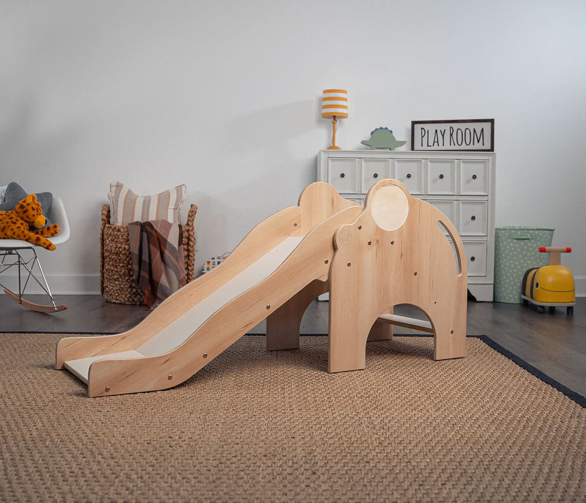 Avenlur Nima elephant slide in a bright living room