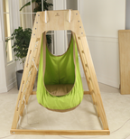 Avenlur sensory swing add-on hanging from a large indoor climber