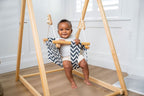 Avenlur Spruce swing set features: foldable, adjustable height, safety harness